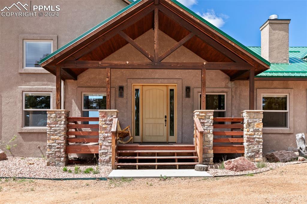 252 Running Elk Point Divide, CO 80814 - Photo 6 of 48 a front view of a house with a garden