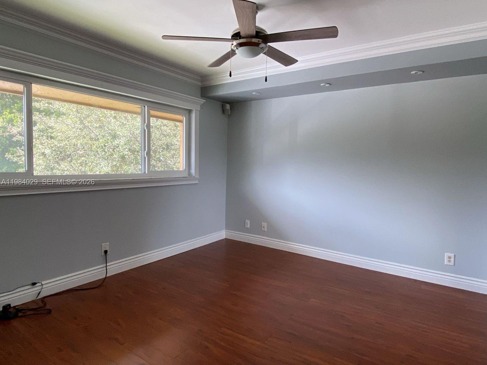 3282 North Pine Island Road, Unit 301 Sunrise, FL 33351 - Photo 20 of 22 an empty room with a window