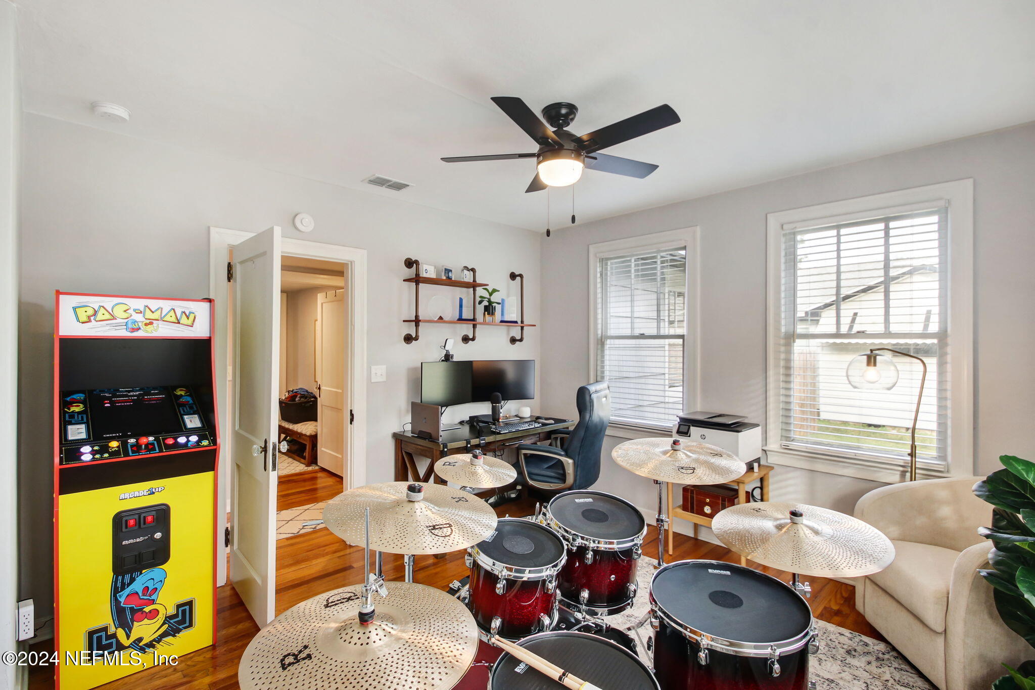 4635 Colonial Avenue Jacksonville, FL 32210 - Photo 29 of 42 a very nice looking living room with furniture and a large window