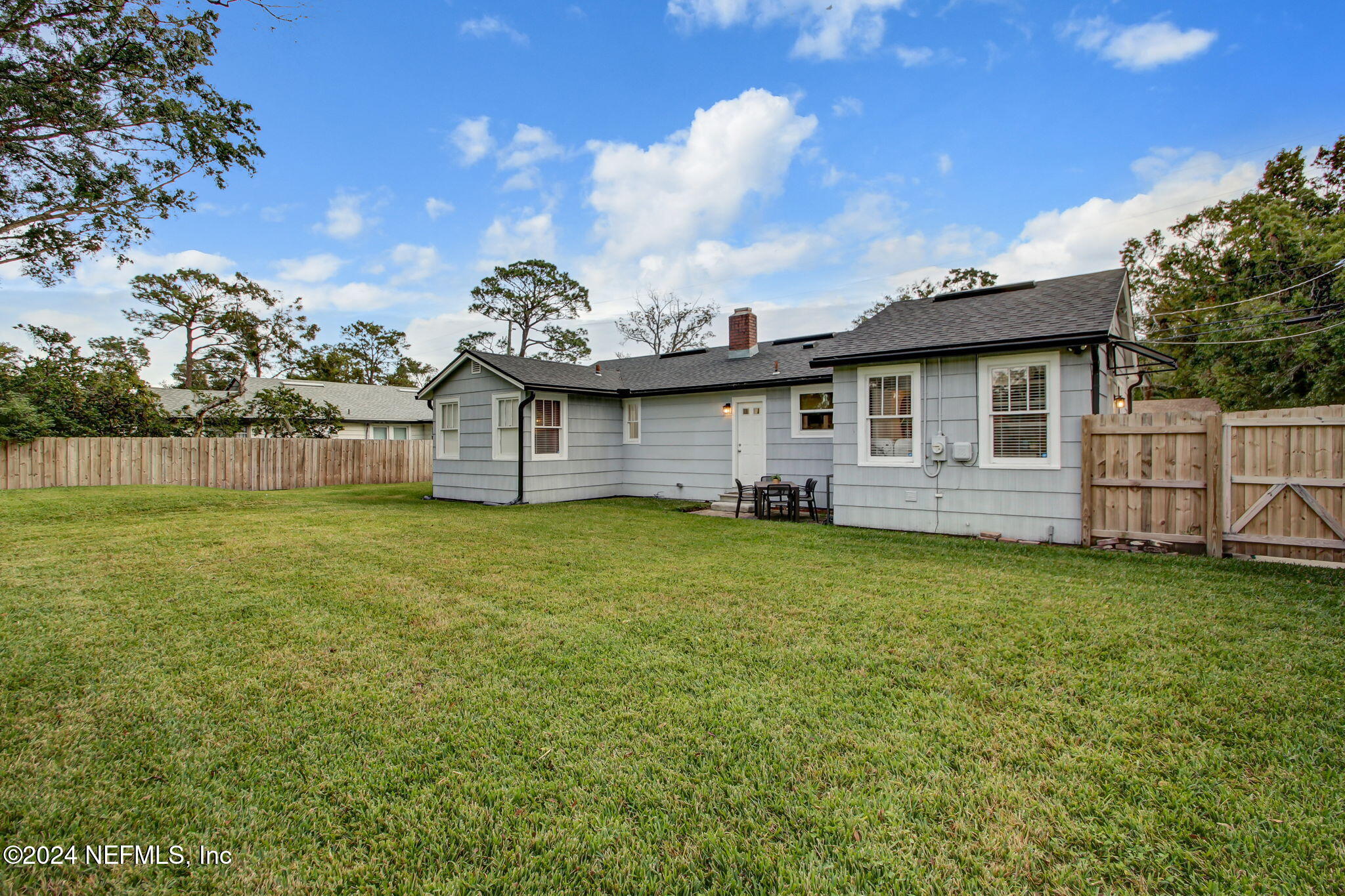 4635 Colonial Avenue Jacksonville, FL 32210 - Photo 39 of 42 a view of a house with a backyard