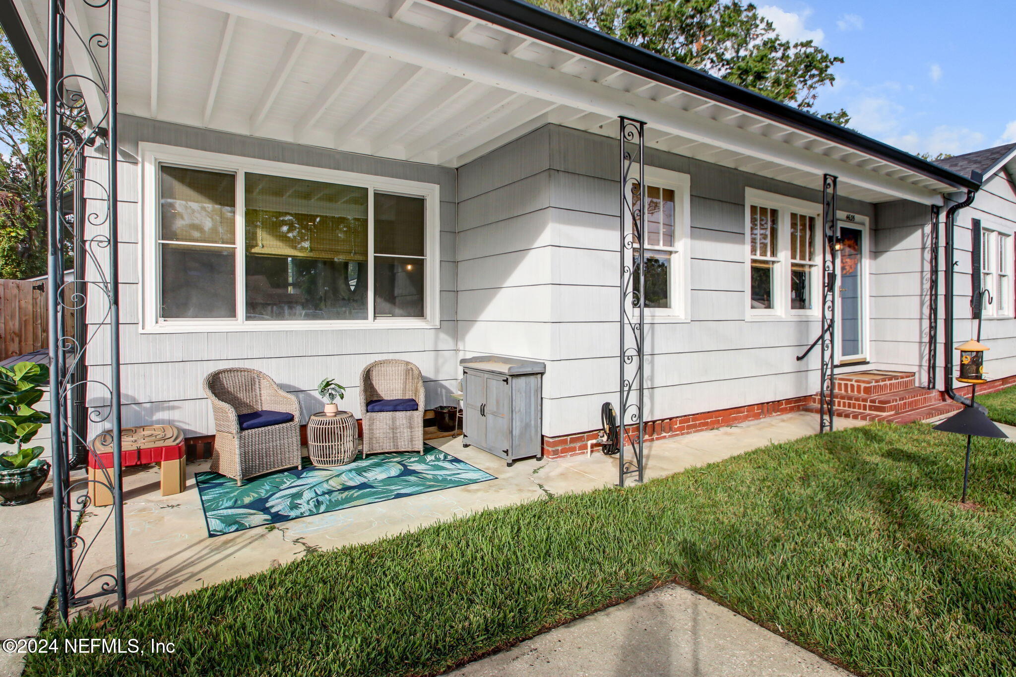 4635 Colonial Avenue Jacksonville, FL 32210 - Photo 4 of 42 a front view of a house with garden
