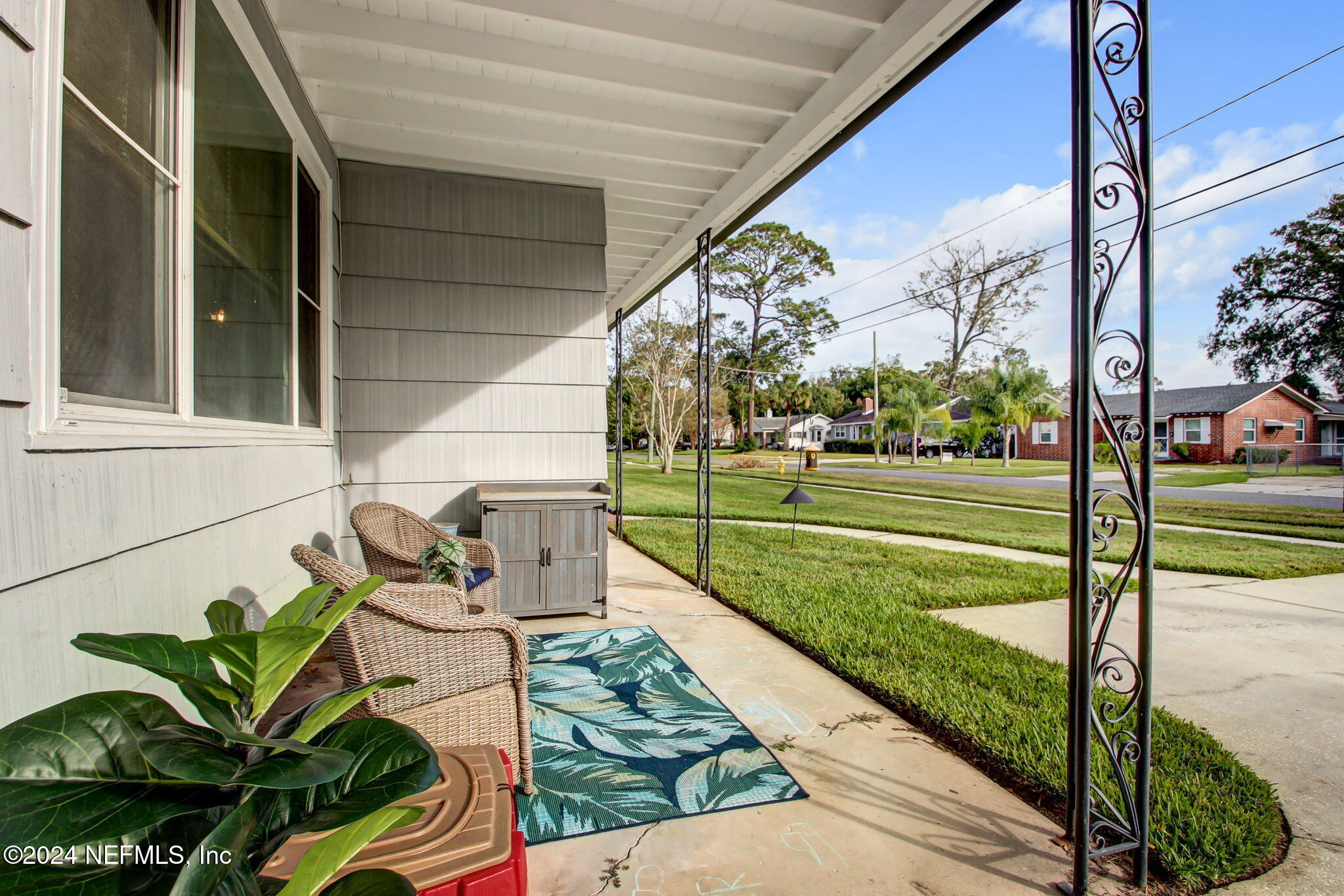 4635 Colonial Avenue Jacksonville, FL 32210 - Photo 5 of 42 a view of a porch with furniture and garden