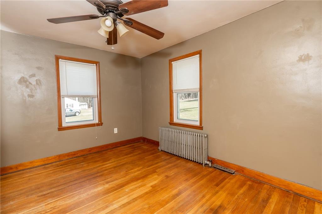 3275 Shellbark Road Armagh, PA 15920 - Photo 6 of 24 a view of an empty room with wooden floor and a window