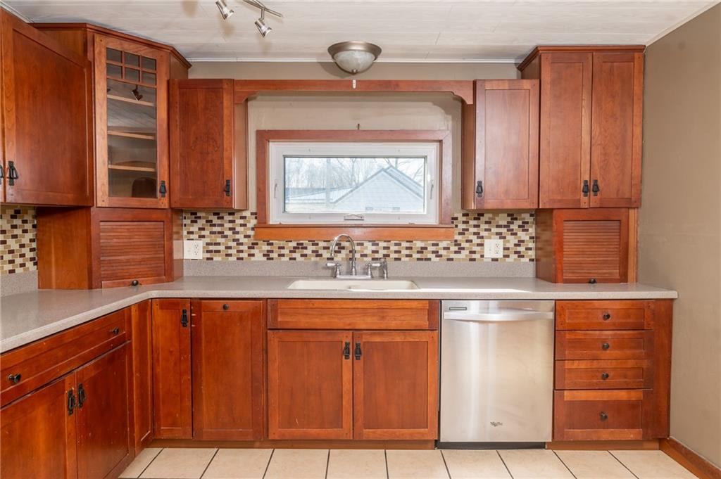 3275 Shellbark Road Armagh, PA 15920 - Photo 9 of 24 a kitchen with granite countertop a sink and cabinets