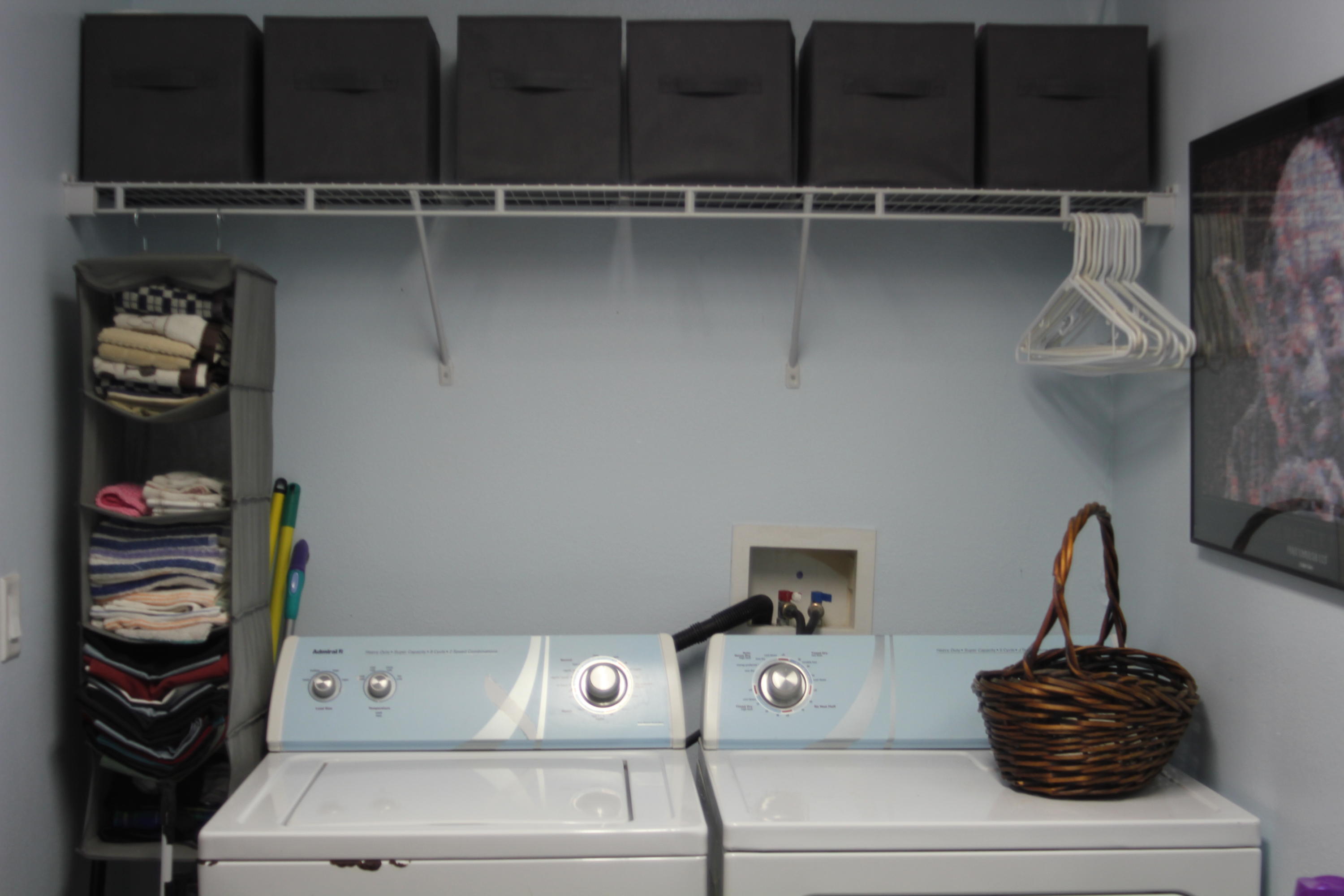 85 Indian Woman Road Santa Rosa Beach, FL 32459 - Photo 19 of 44 a view of kitchen appliances with racks on the wall