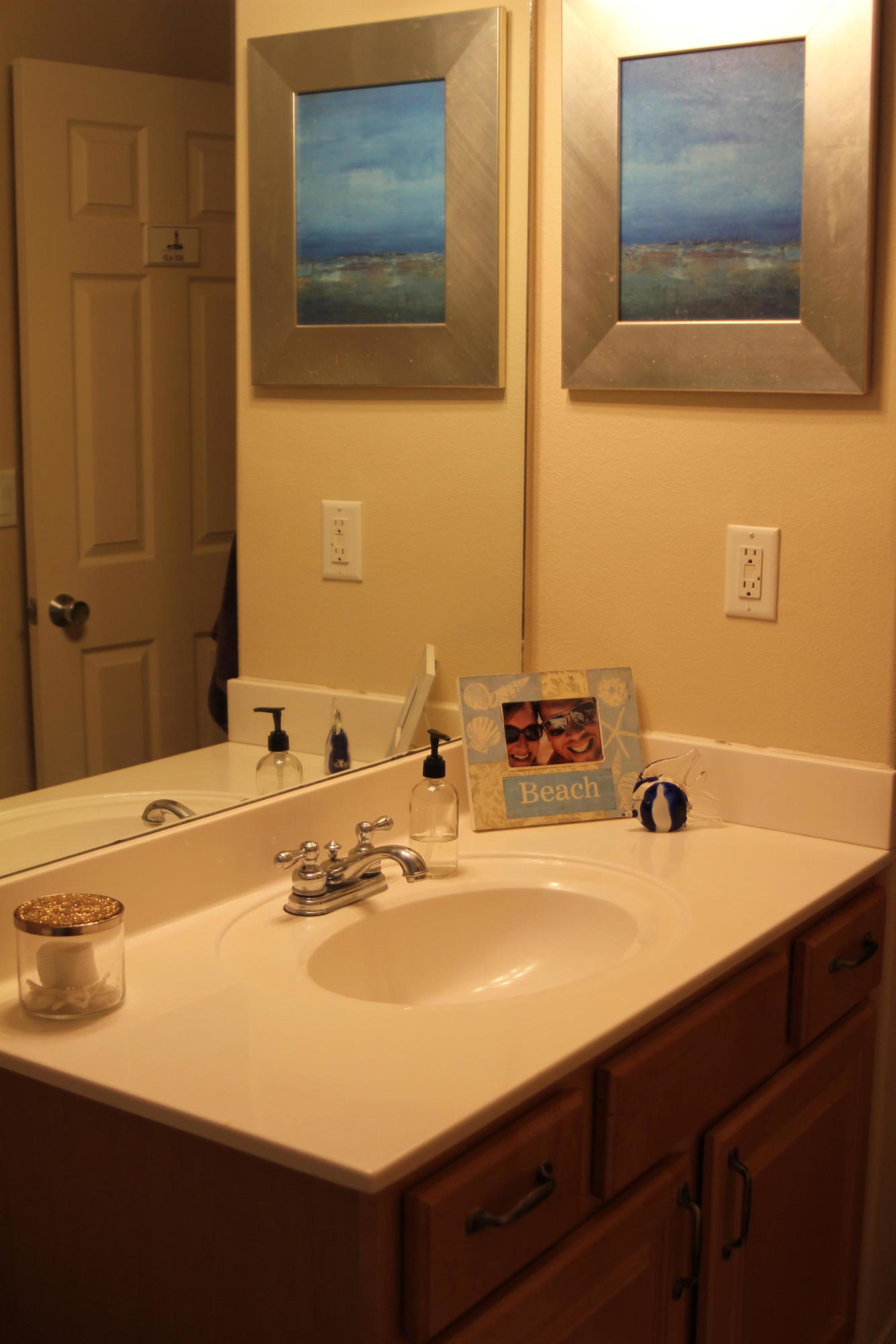 85 Indian Woman Road Santa Rosa Beach, FL 32459 - Photo 24 of 44 a bathroom with a sink and a mirror