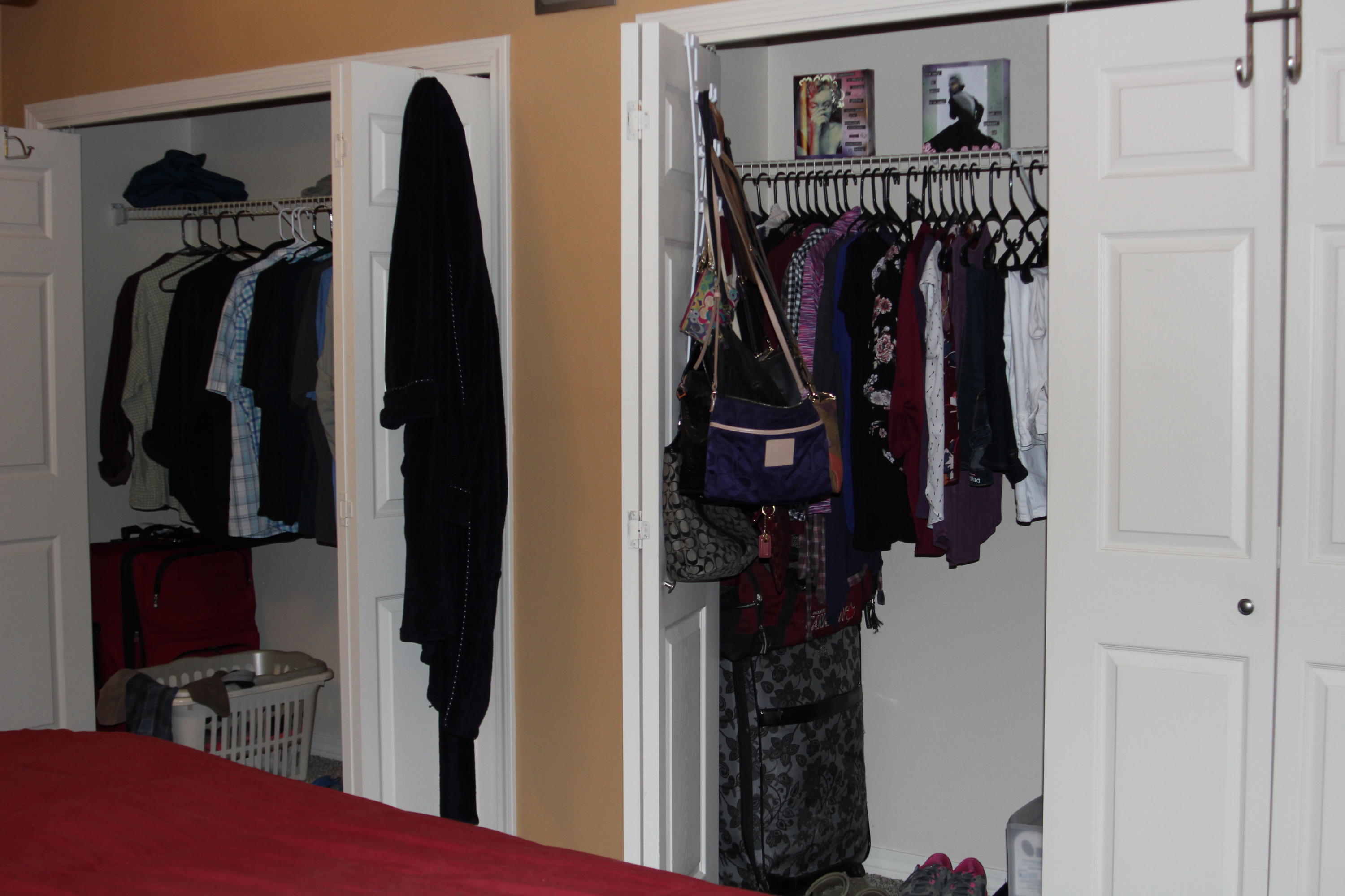 85 Indian Woman Road Santa Rosa Beach, FL 32459 - Photo 28 of 44 a view of walk in closet with clothes and shoes