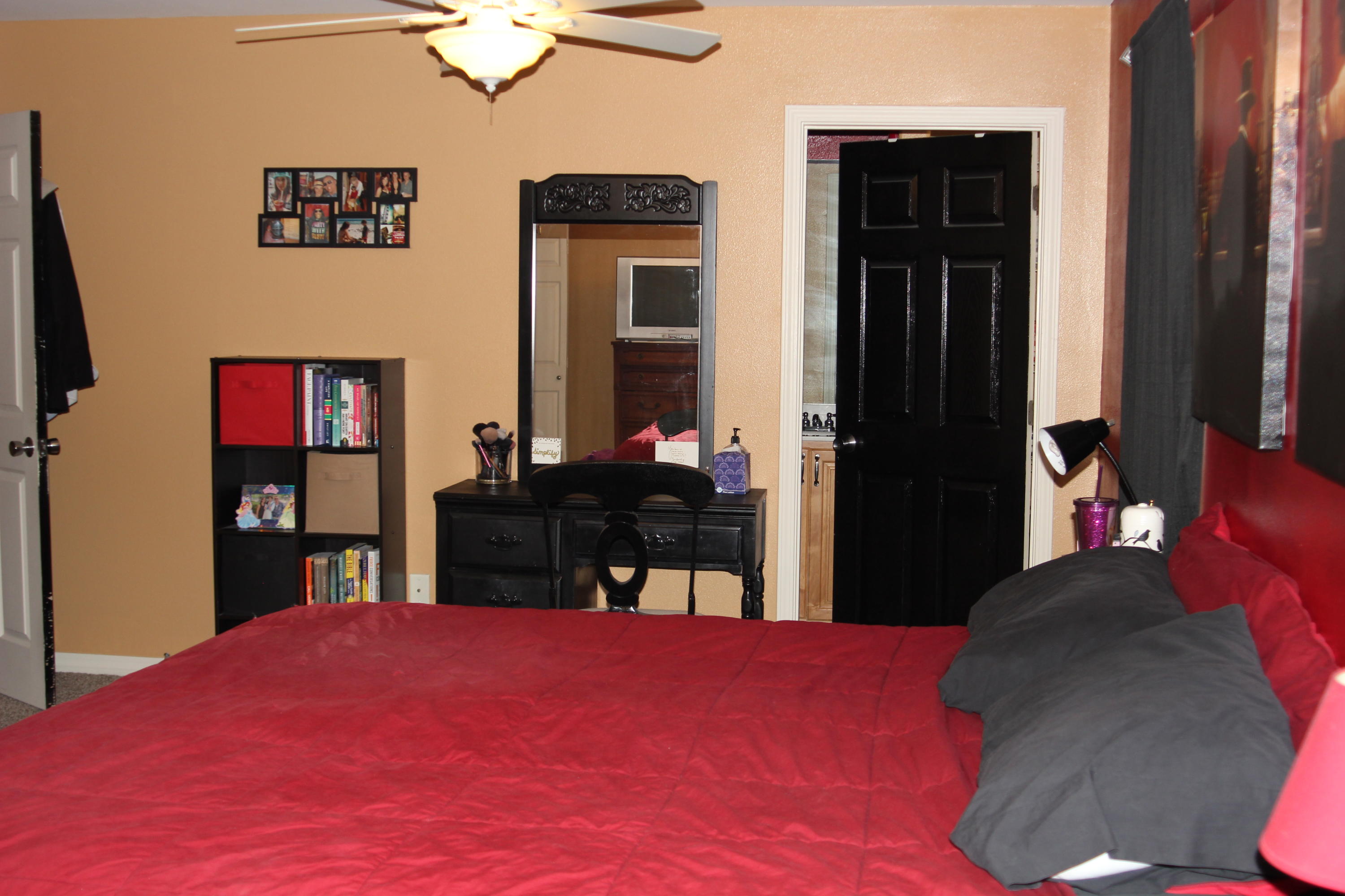 85 Indian Woman Road Santa Rosa Beach, FL 32459 - Photo 29 of 44 a bedroom with a bed and a flat tv screen on dresser