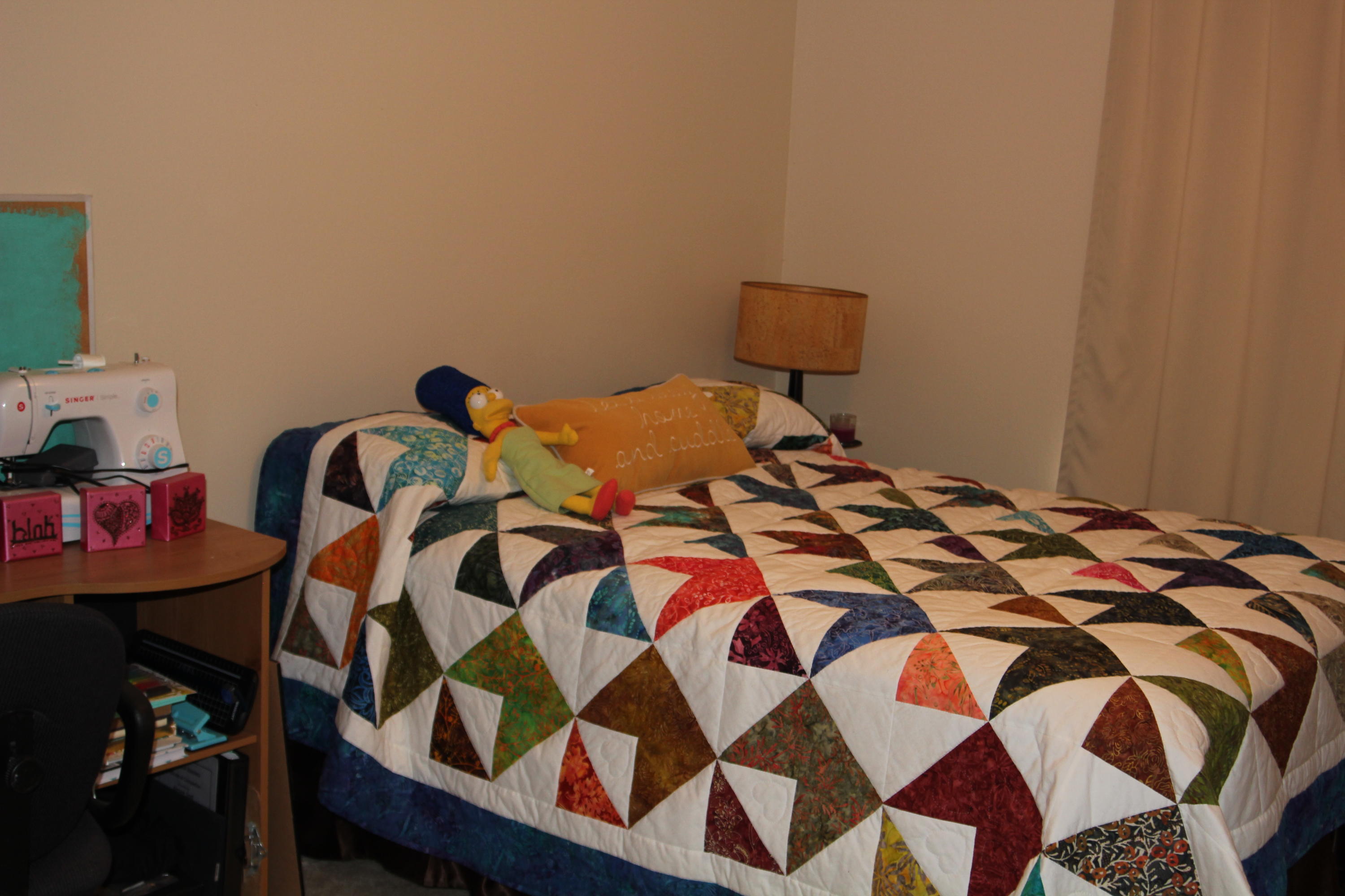 85 Indian Woman Road Santa Rosa Beach, FL 32459 - Photo 36 of 44 a bedroom with a bed and a lamp on dresser