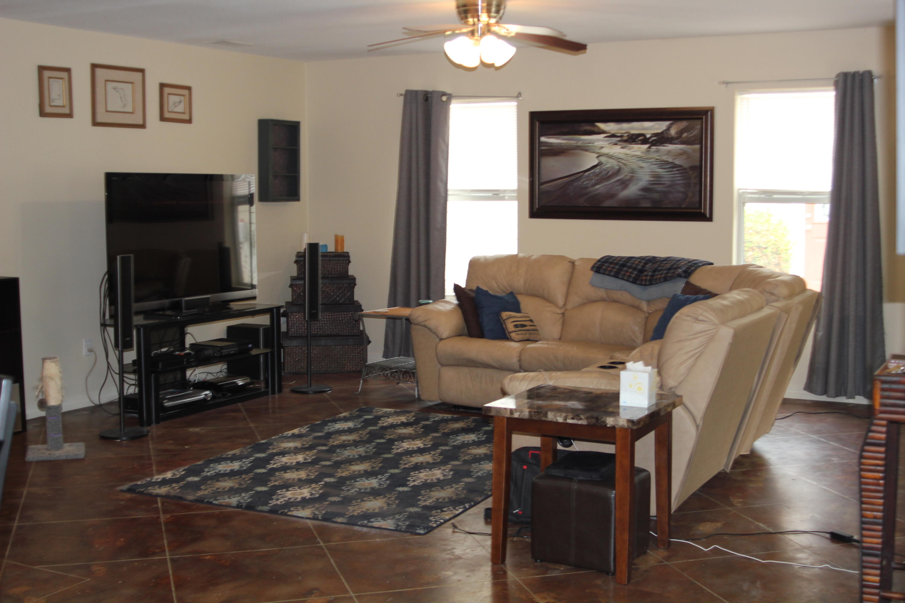 85 Indian Woman Road Santa Rosa Beach, FL 32459 - Photo 8 of 44 a living room with furniture and a flat screen tv