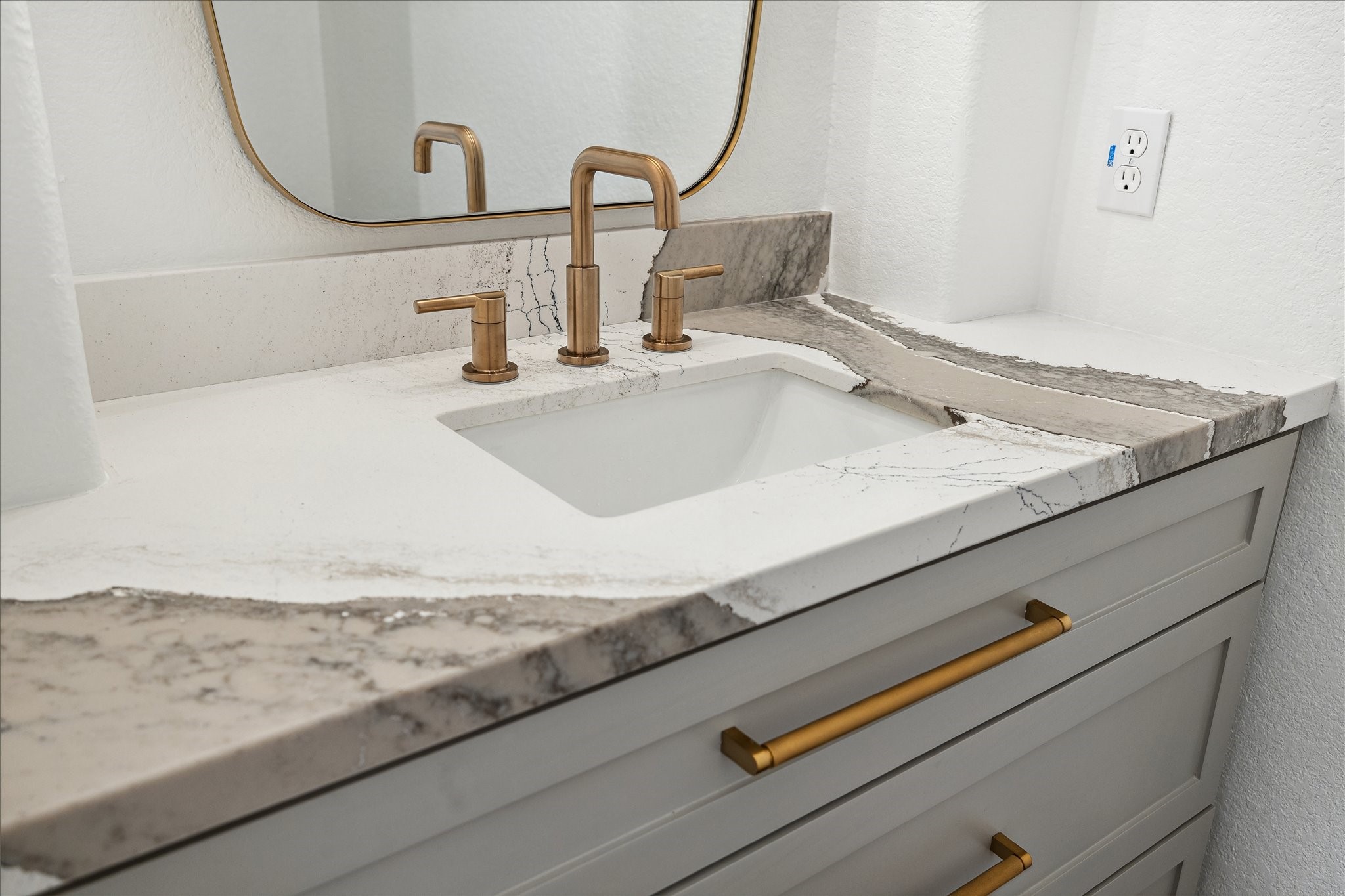 6211 Alameda Point Lane Houston, TX 77041 - Photo 27 of 50 Stylishly updated powder bath featuring designer quartz countertops, fresh light paint, and modern finishes.