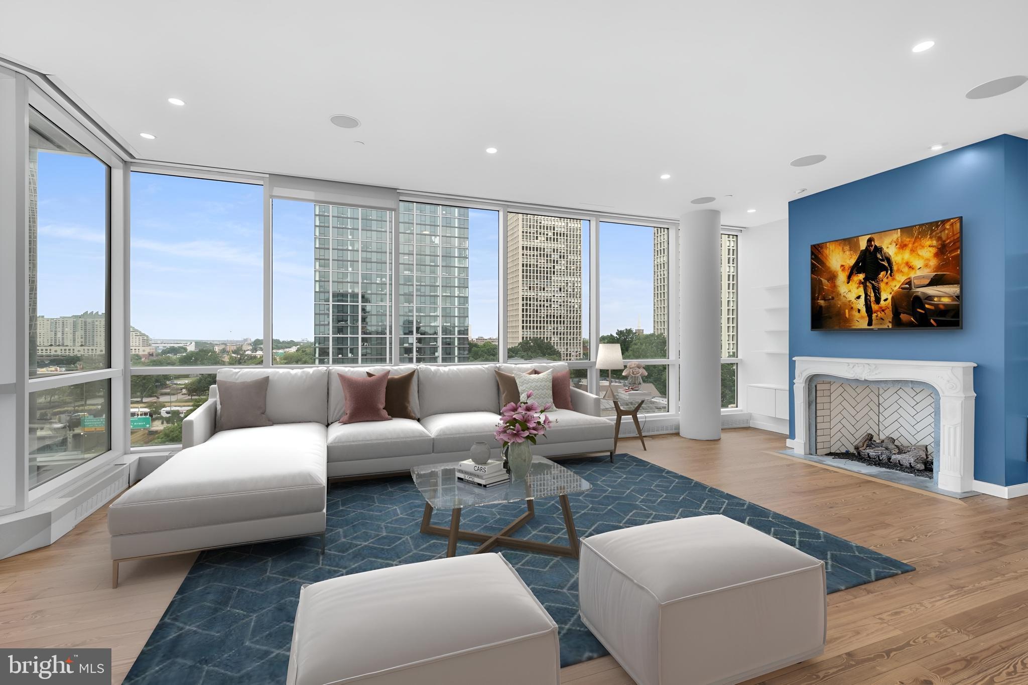 101 Walnut Street, Unit 6 Philadelphia, PA 19106 - Photo 2 of 21 a living room with furniture a large window and a flat screen tv