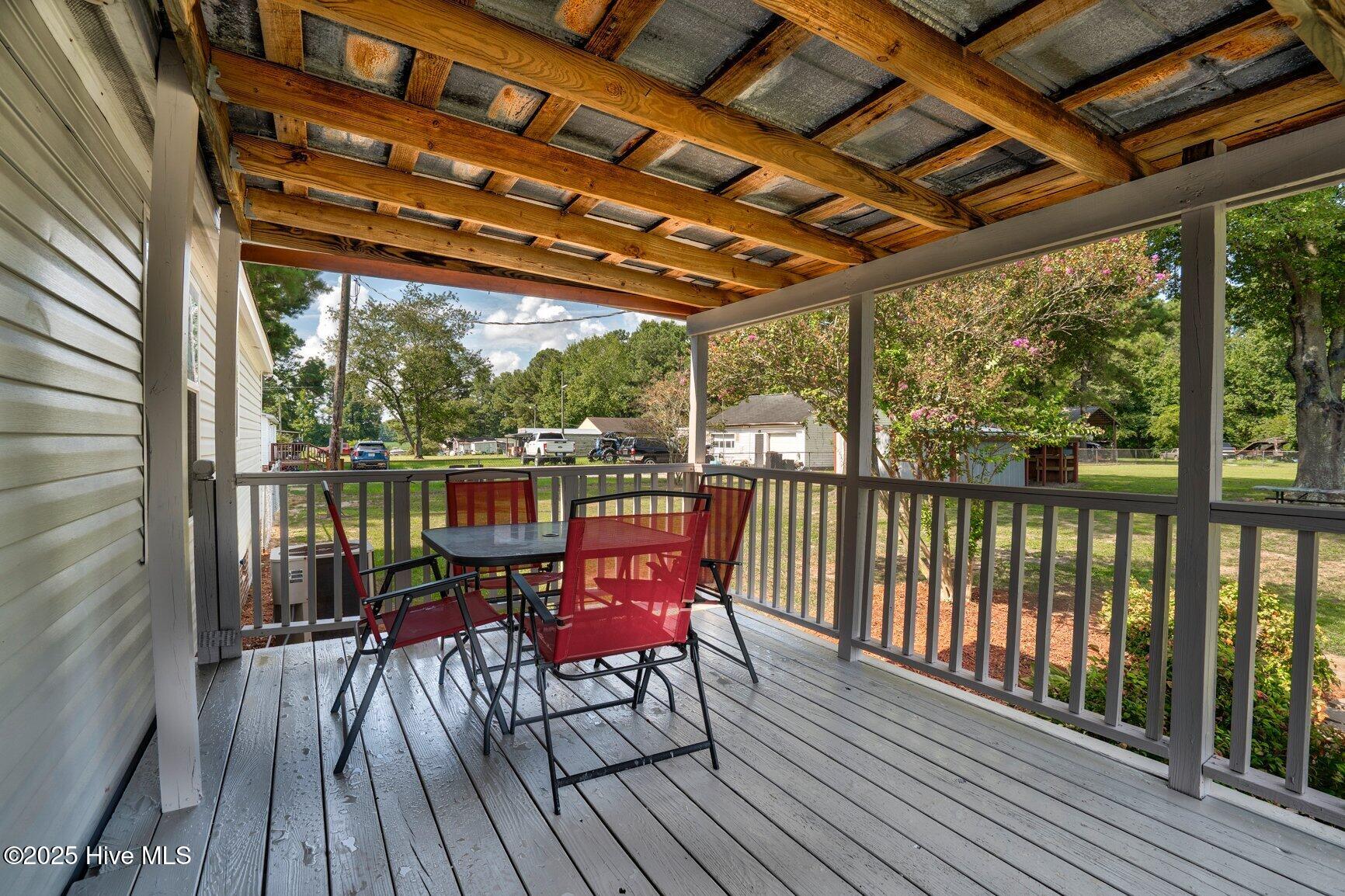 4541 Faith Baptist Church Road Pinetops, NC 27864 - Photo 23 of 29 Covered Back Porch