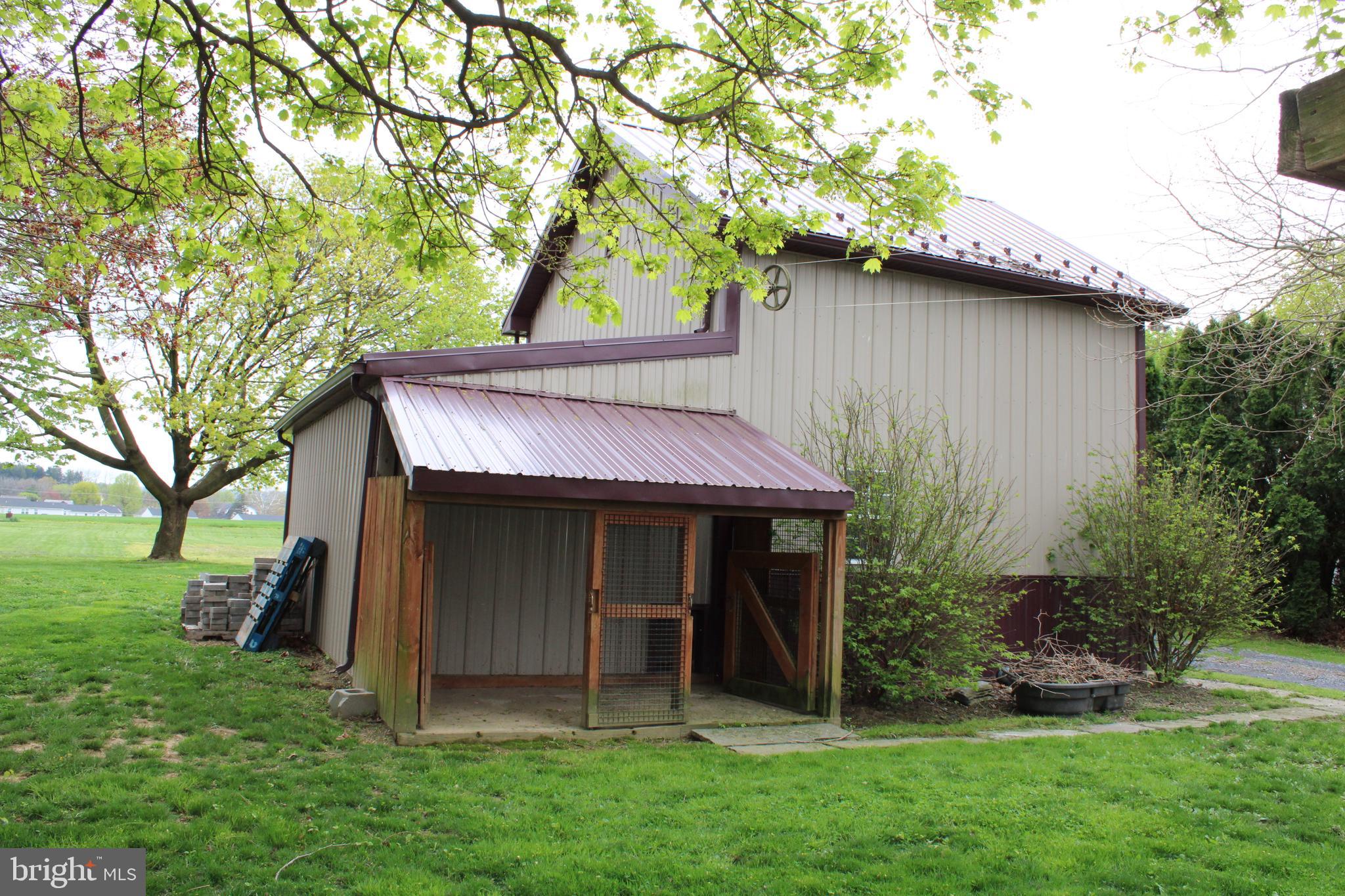 165 Short Road Stevens, PA 17578 - Photo 6 of 19 a view of a house with a yard and tree