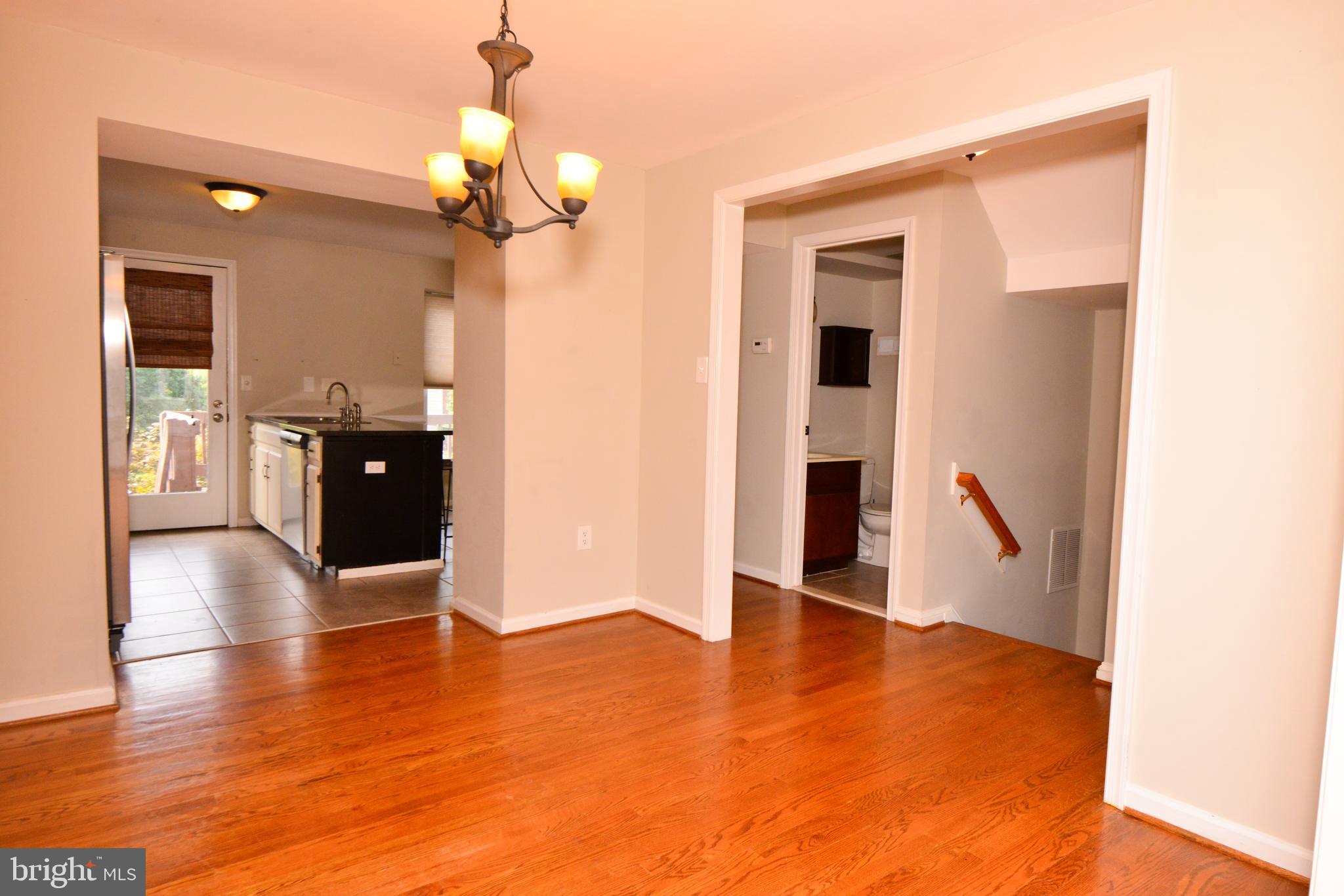 8013 Hollow Reed Court Frederick, MD 21701 - Photo 14 of 34 Dining room towards kitchen and hall area.