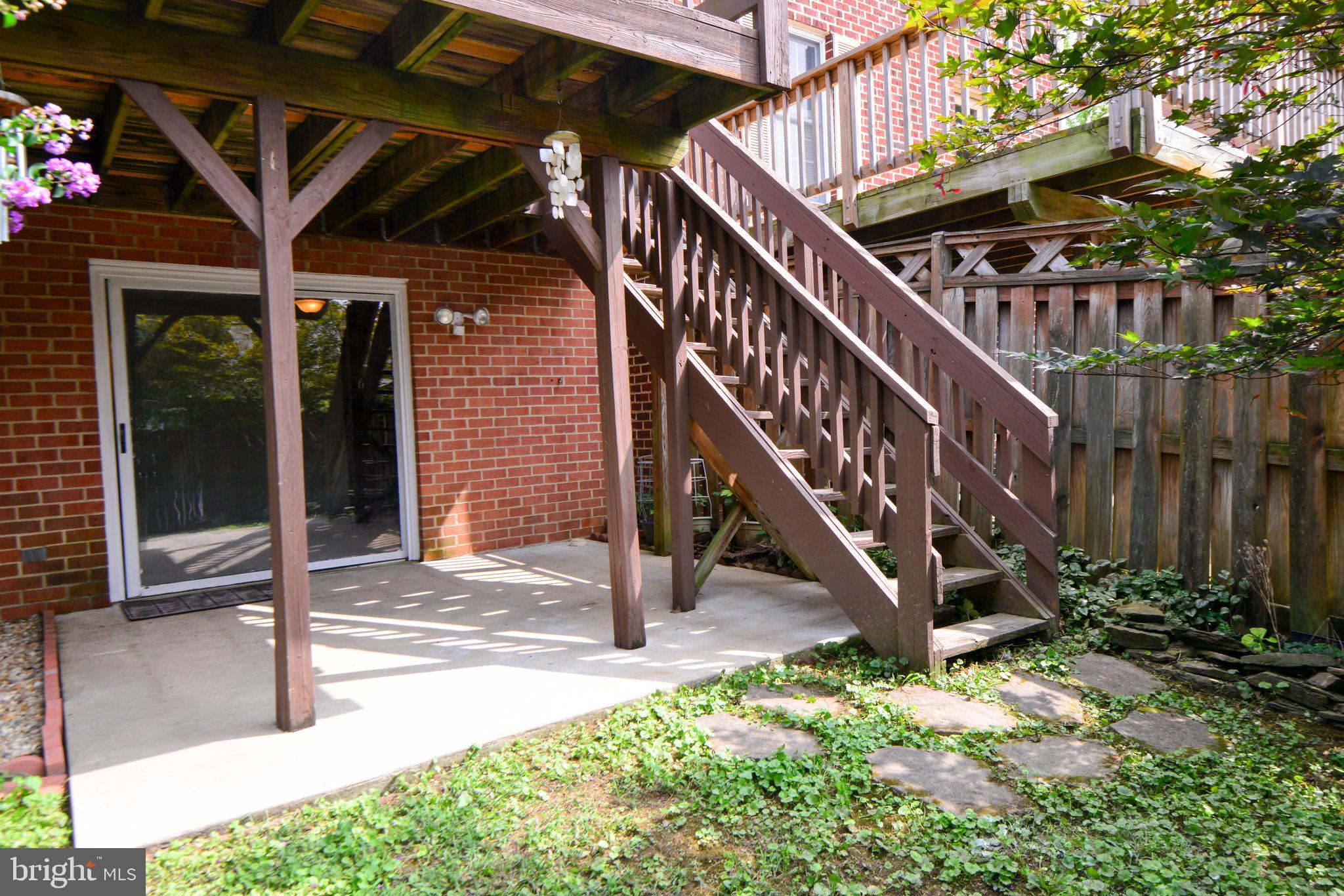 8013 Hollow Reed Court Frederick, MD 21701 - Photo 31 of 34 Deck w/stairs to yard and sliders to family room.