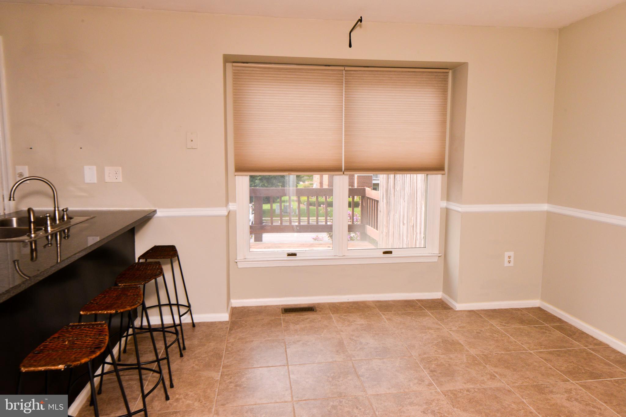 8013 Hollow Reed Court Frederick, MD 21701 - Photo 7 of 34 Eat-in kitchen overlooks rear yard.