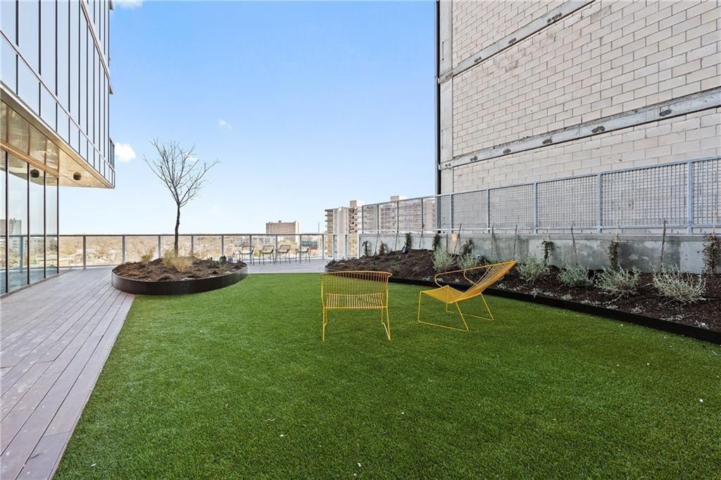 48 East Avenue, Unit 1503 Austin, TX 78701 - Photo 25 of 40 a view of a house with backyard and sitting area