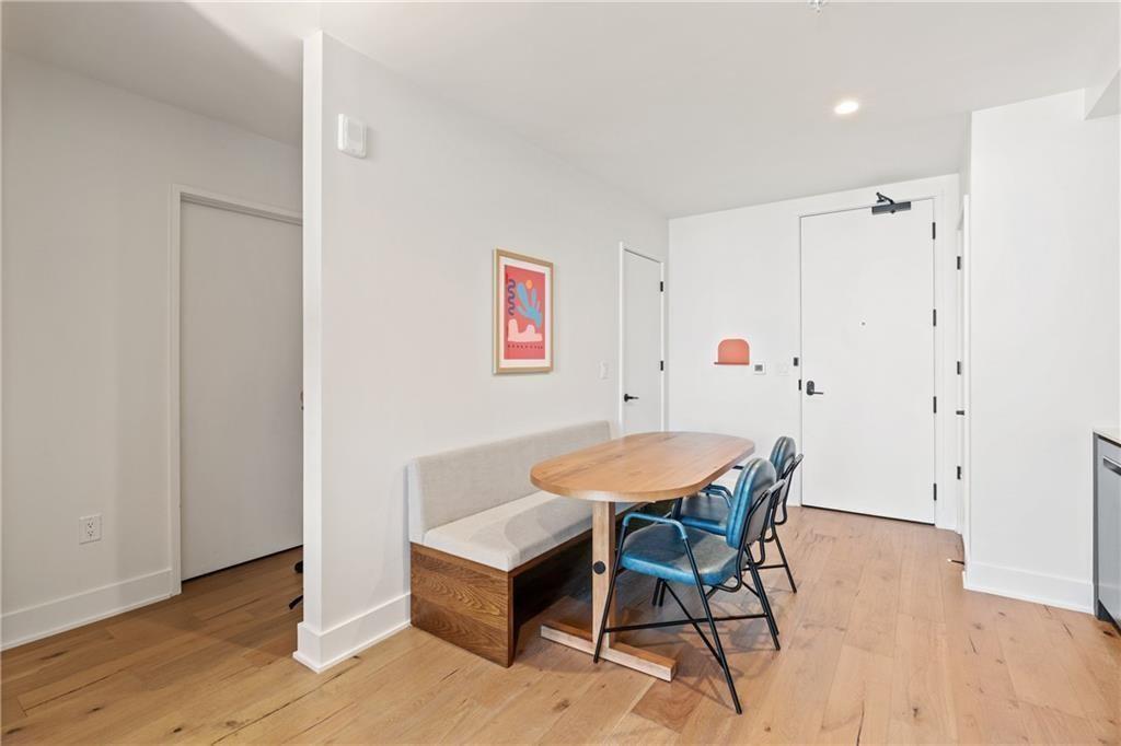 48 East Avenue, Unit 1503 Austin, TX 78701 - Photo 7 of 40 a view of a room with furniture and wooden floor