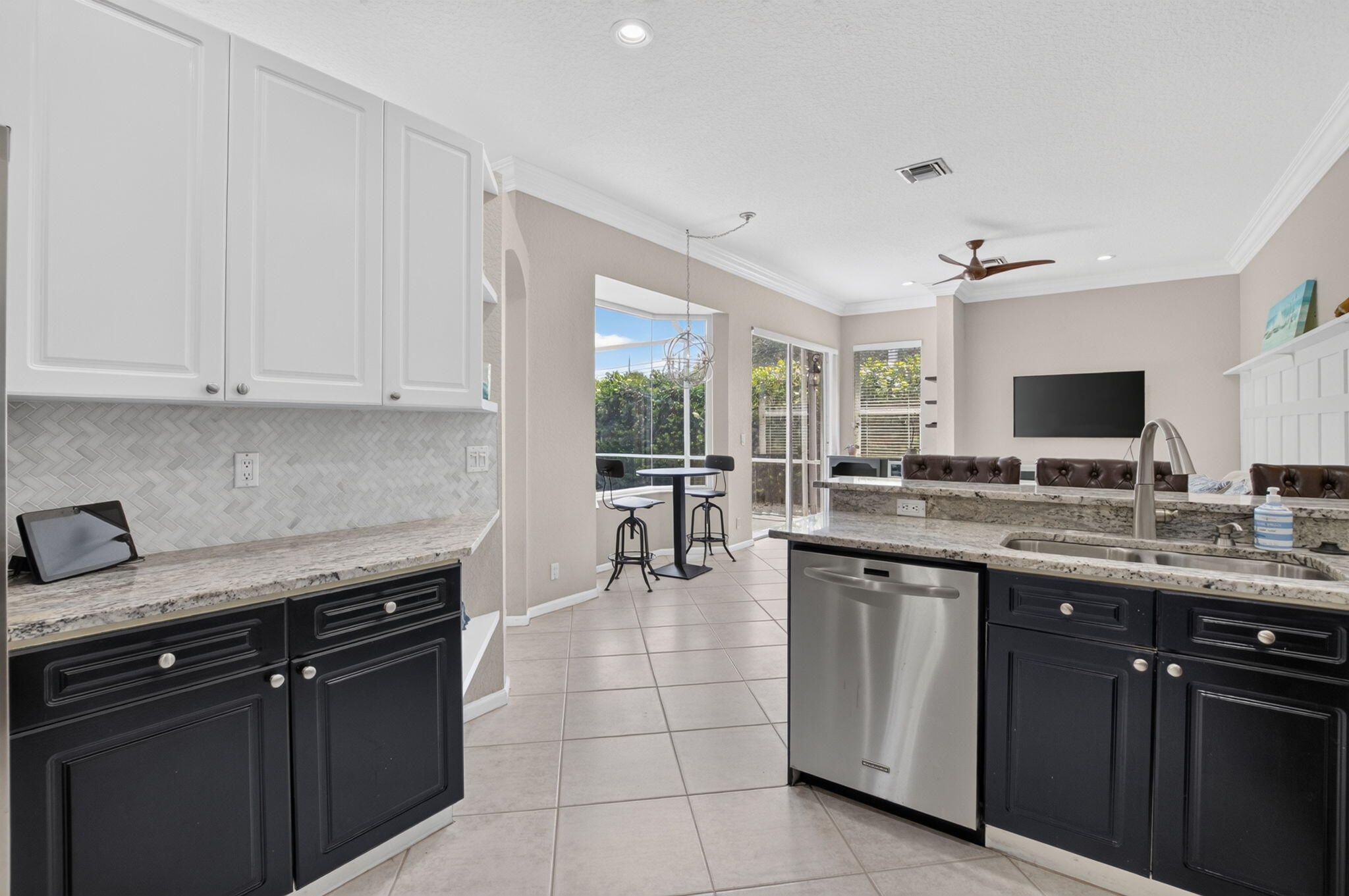 1365 East Barwick Ranch Circle Delray Beach, FL 33445 - Photo 38 of 77 a kitchen with a sink and cabinets