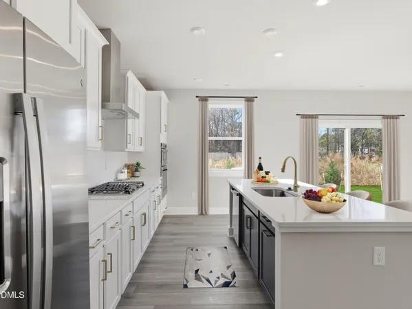 a bedroom with a large bed and a large window