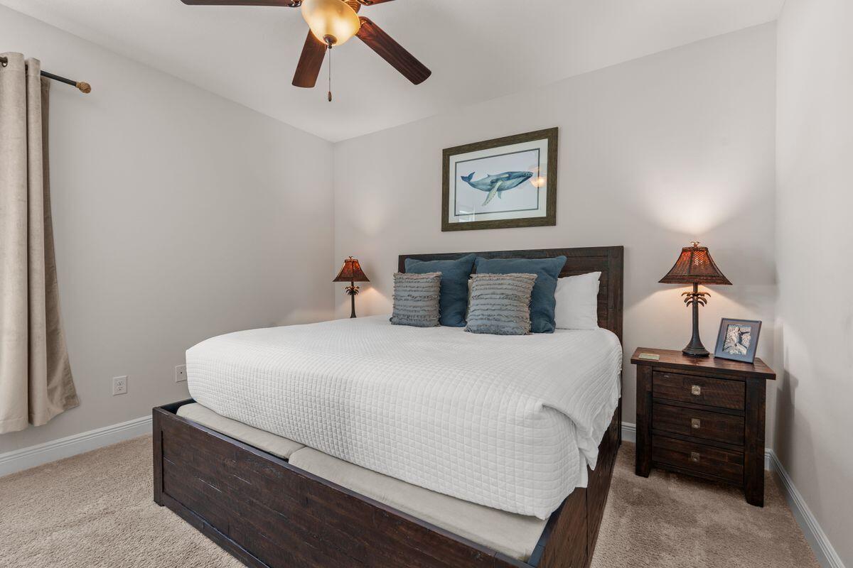 38 Inlet Cove Inlet Beach, FL 32461 - Photo 15 of 29 a bedroom with a bed and painting on the wall