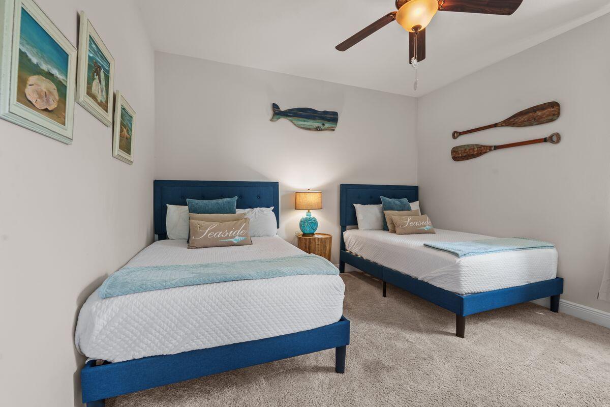 38 Inlet Cove Inlet Beach, FL 32461 - Photo 17 of 29 a bedroom with a bed lamp and furniture