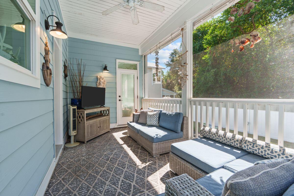 38 Inlet Cove Inlet Beach, FL 32461 - Photo 18 of 29 a living room with furniture and a flat screen tv