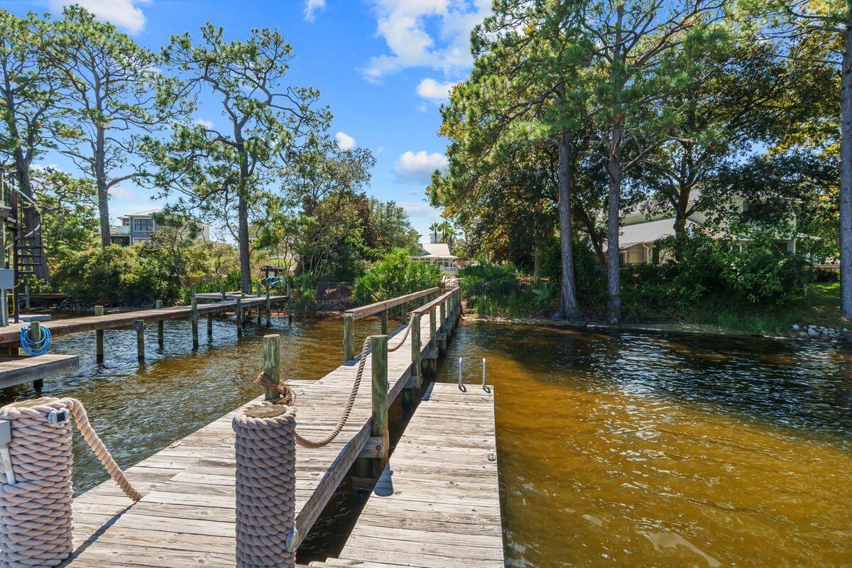 38 Inlet Cove Inlet Beach, FL 32461 - Photo 26 of 29 a view of a wooden deck and lake