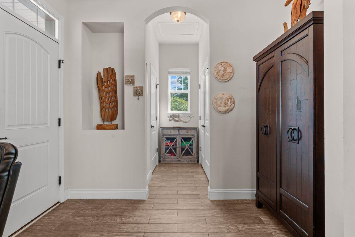 38 Inlet Cove Inlet Beach, FL 32461 - Photo 4 of 29 a view of a entryway door with couch