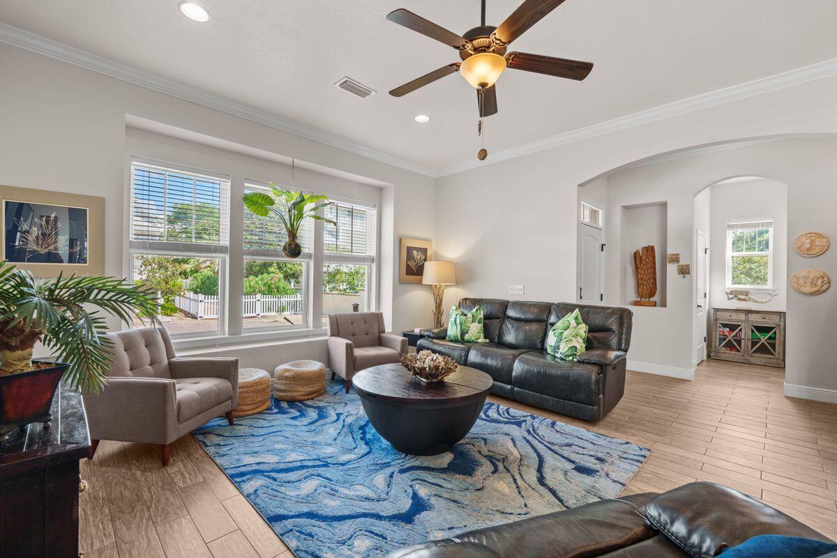 38 Inlet Cove Inlet Beach, FL 32461 - Photo 5 of 29 a living room with couches a coffee table and a potted plant