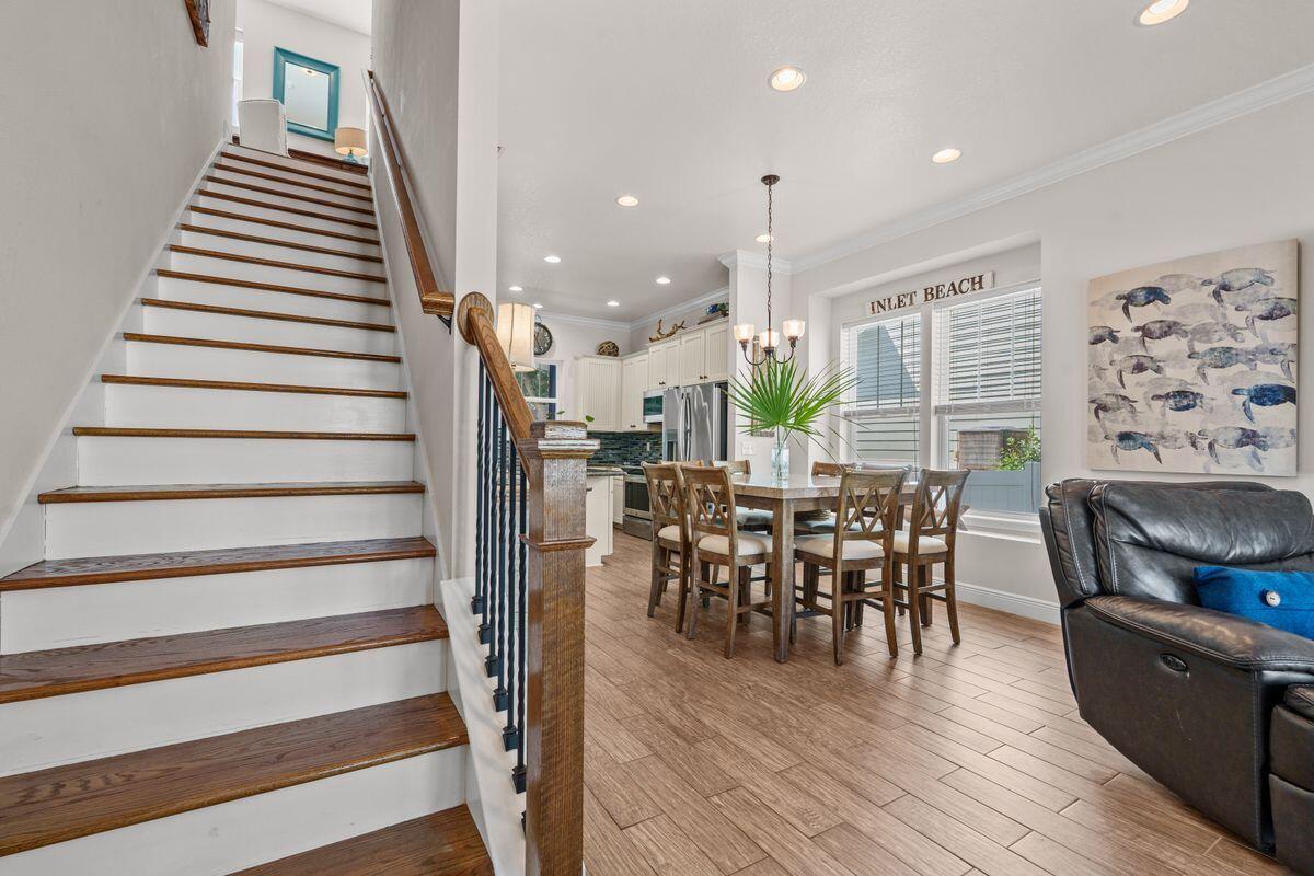38 Inlet Cove Inlet Beach, FL 32461 - Photo 10 of 29 a view of a dining room with furniture and wooden floor