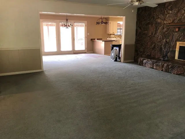 a view of a livingroom with a fireplace