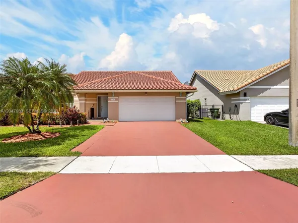 $820,000 | 16203 Northwest 8th Drive, Pembroke Pines, FL 33028