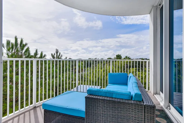 a spacious bathroom with a toilet sink and mirror