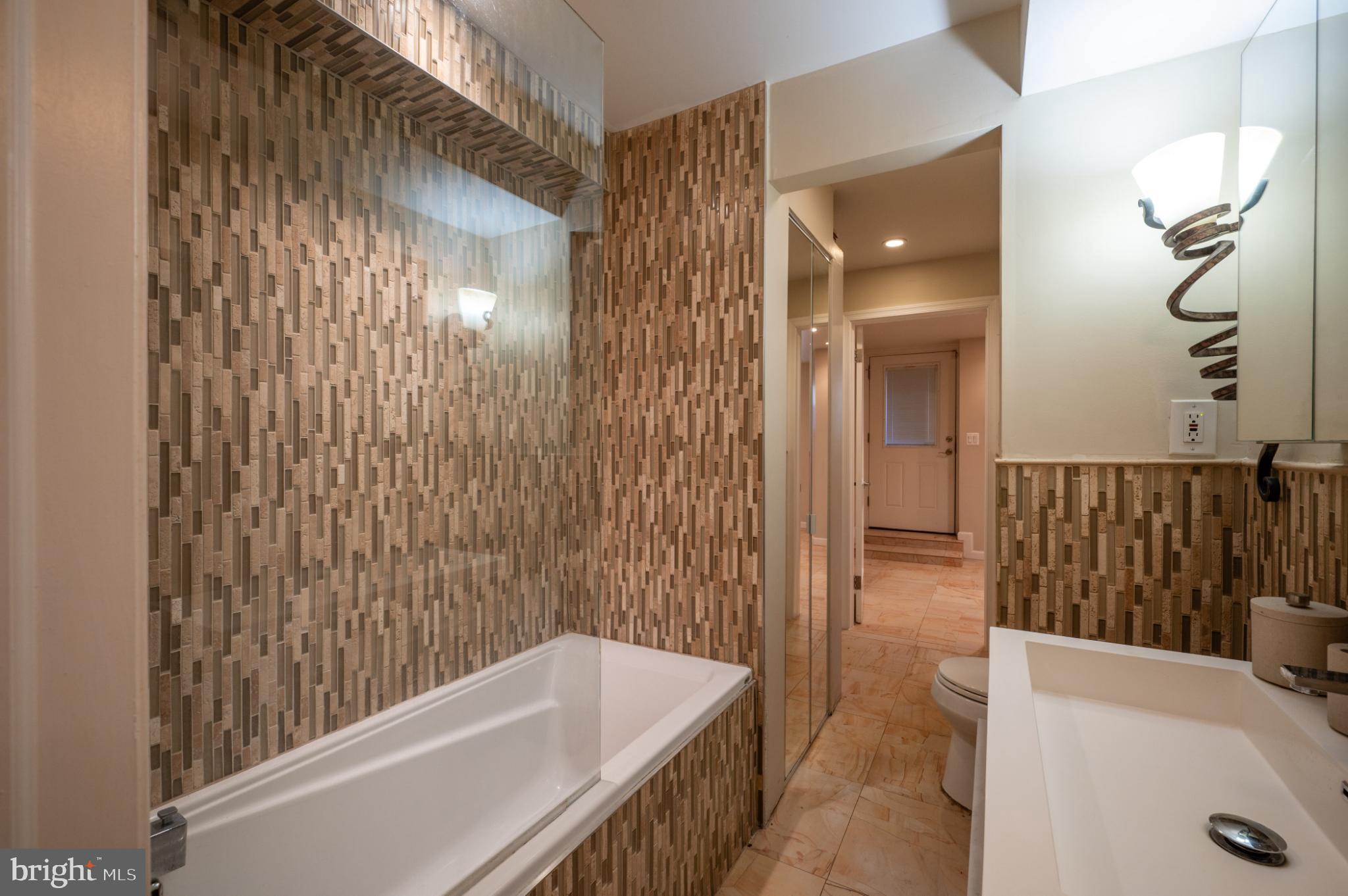 118 Bryant Street Northwest Washington, DC 20001 - Photo 41 of 49 Stylish bathroom with modern tile accents.