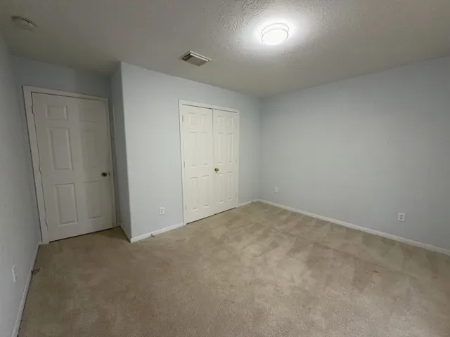 an empty room with window