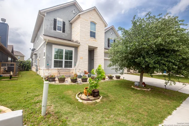 a house with garden in front of it