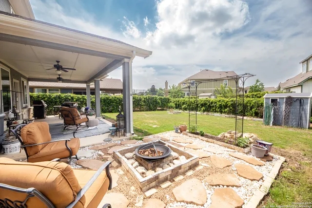 a view of a patio with a big yard