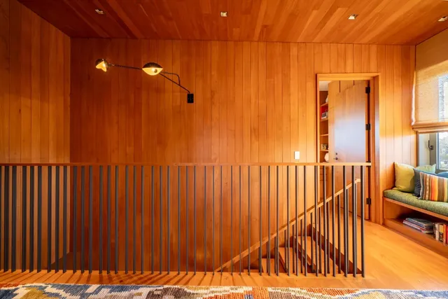 a view of balcony with furniture