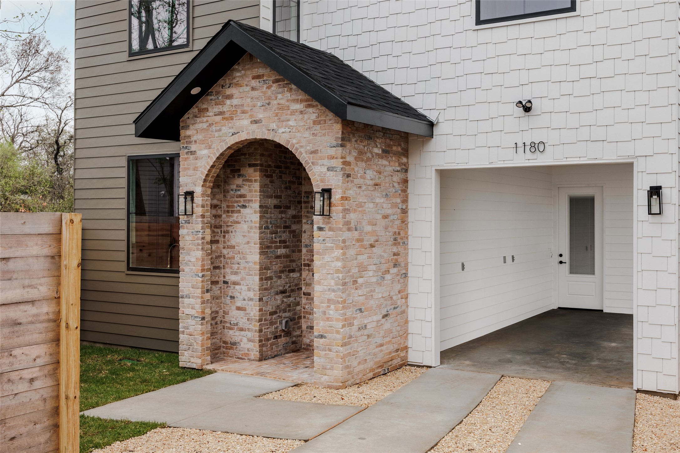 1180 Ridgeway Drive, Unit 2 Austin, TX 78702 - Photo 4 of 40 Doorway to property featuring brick siding