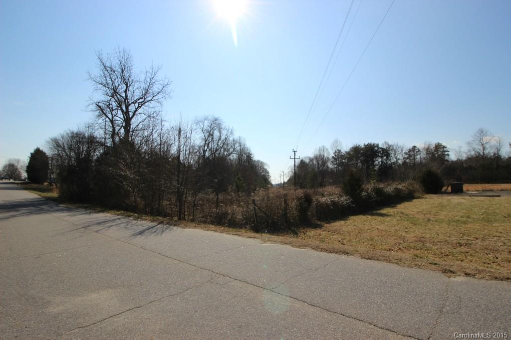 0 Laura Road Mooresville, NC 28117 - Photo 1 of 5 a backyard of a house with lots of green space