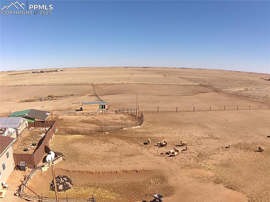 3835 Sengbeil Road Yoder, CO 80864 - Photo 47 of 48 Aerial view with a desert view and a rural view