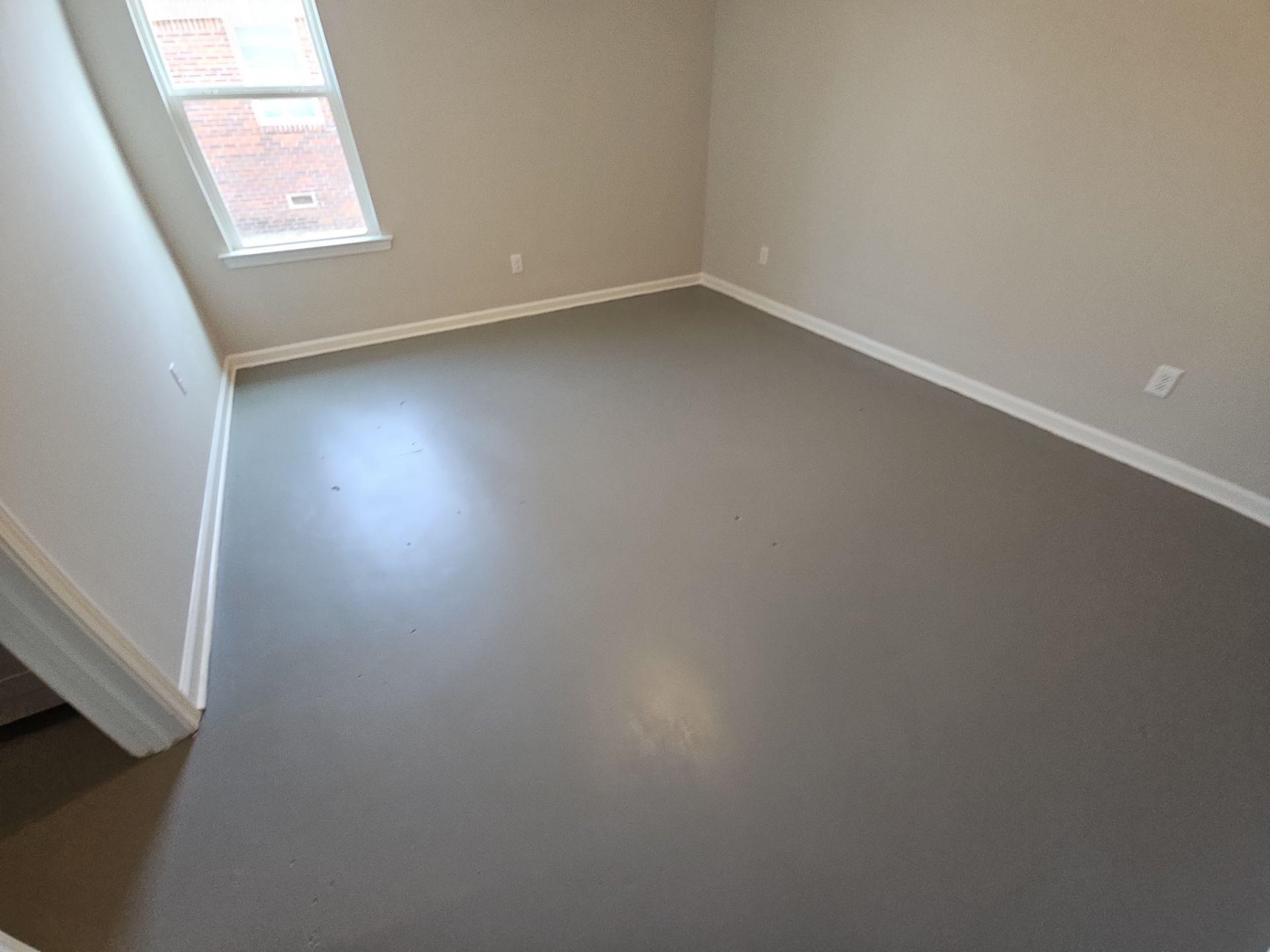 697 Granada Road Memphis, TN 38109 - Photo 2 of 7 an empty room with a window