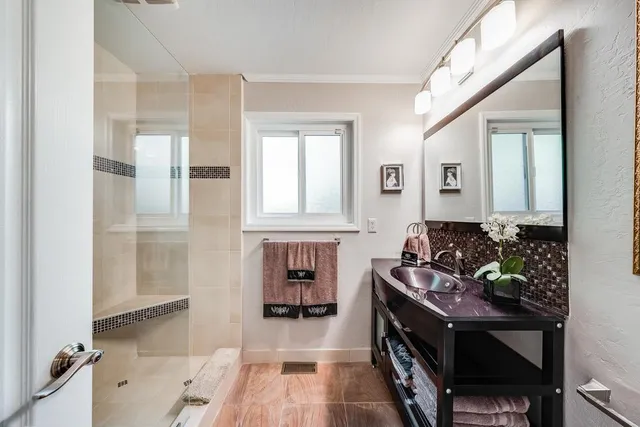 a living room with furniture or couch and a flat screen tv