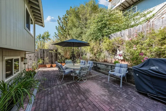 a view of a dinning tables and chairs in the patio