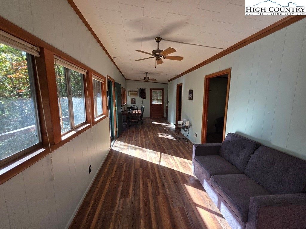 4091 Big Ivy Road Purlear, NC 28665 - Photo 16 of 40 a living room with furniture and a large window