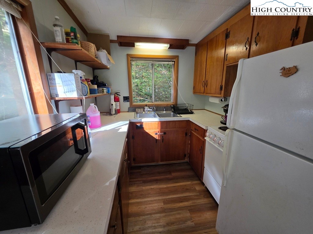 4091 Big Ivy Road Purlear, NC 28665 - Photo 18 of 40 a storage room with cabinets