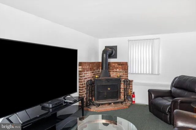 a living room with a couch and a flat screen tv