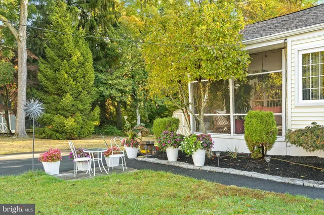 a view of a sitting area with furniture and garden
